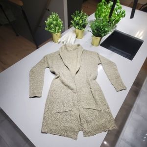 Jolie veste à manches longues en lainage avec poches latérales, beige et noir